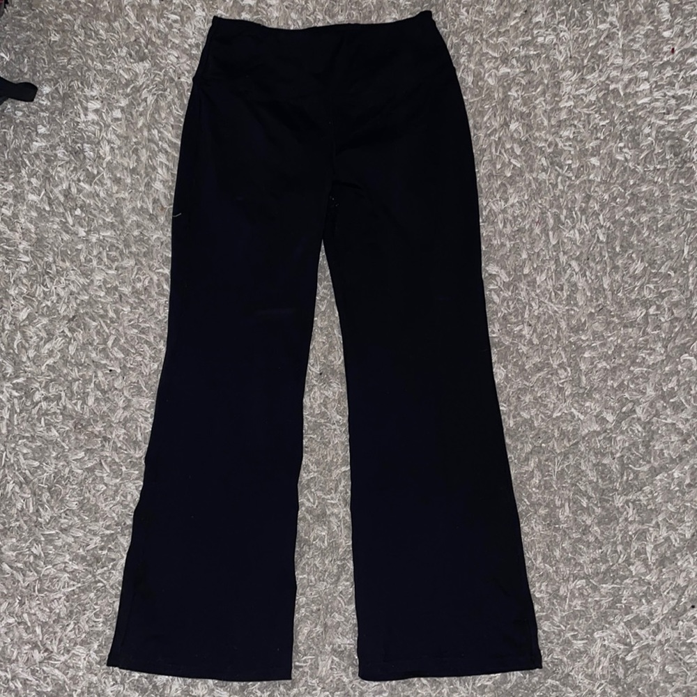 Black flare leggings. Thick waist band with small pocket in waist